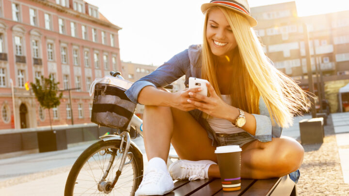 Young woman on Instagram looking at reels.